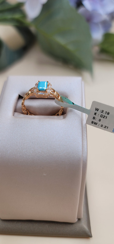 خاتم_على_شكل_سلسلة_يتوسطه_حجر_بلون_التيفاني_الرائع_على_كل_ألوان_البشرة&خاتم-ترند-أقل_من_5جم_&21_&2.1.jpg