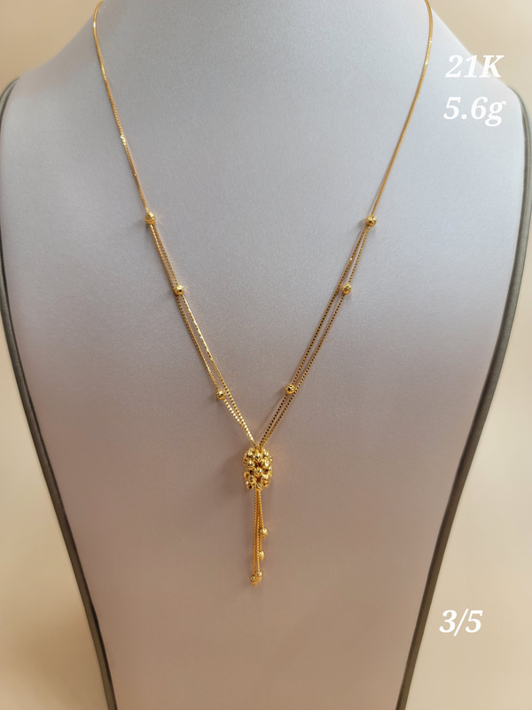 عقد خيطين بسحبة عنقود من المنتصف