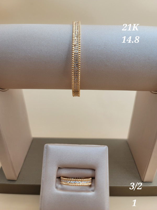 طقم اسوارة و خاتم راقي بفصوص من المنتصف و تكويرات جانبية