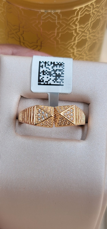 خاتم أنيق برأسين متعاكسين ومضلعين بفصوص 