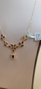 عقد بزخرفة منتشرة و متدلية من الزركون وحجر الزفير الكحلي 