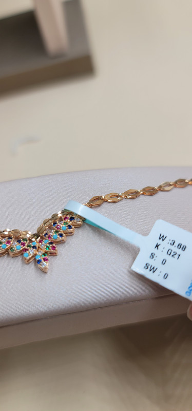 إسوارة أنيقة بألوان الفيروزي و الكحلي و الفوشي 